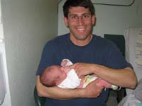 57-Chris_holding_Kenny-he_has_death_grip_on_Chris'_finger