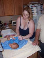 02-Kristi_getting_Kenny_ready_for_his_first_bath