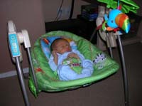 12-Kenny_sleeping_in_swing_unfortunately_recalled_May_30_2007