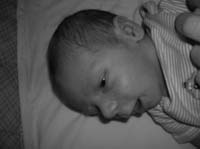 09-close-up_of_Kenny_in_crib-bw