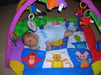 07-Kenny_playing_in_Baby_Einstein-if_you_call_it_playing