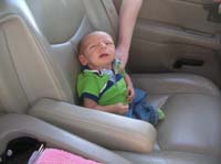 13-Kenny_sitting_in_the_driver's_seat