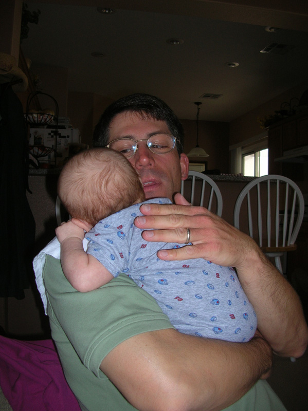 32-Daddy_holding_Kenny