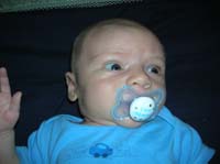 01-Kenny_sucking_on_a_new_pacifier-I_love_Mommy