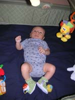 19-Kenny_laying_down_in_his_Pack_n_Play