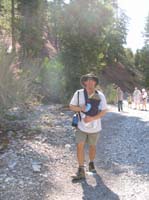 01-Chris_carrying_Kenny_on_sunny_trail_to_Mary_Jane_Falls