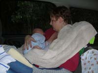 17-Kristi_consoling_not_dry_Kenny-he_was_soaking_wet-slept_entire_time_rainy_and_hailing_and_wet