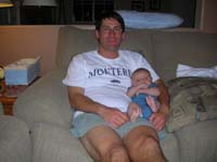 05-Kenny_in_Daddy's_arms_on_couch