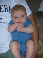 06-Kenny_is_sucking_on_his_hand_really_intently