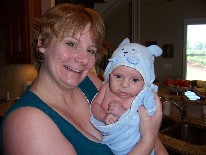 25-Kristi_holding_Kenny_after_his_bath