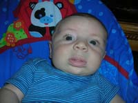 06-close-up_of_Kenny_sitting_in_his_vibrating_chair