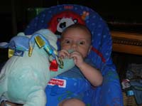 10-chewing_on_his_stuffed_toy