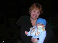 017-Kenny_and_Mommy_hanging_out_by_the_fire