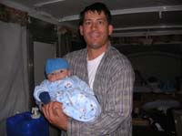 022-Daddy_with_Kenny_bundled_up_after_cold_night_with_no_heat