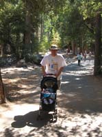 031-Daddy_pushing_Kenny_along_the_paved_trail