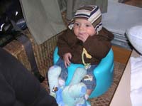 104-Kenny_all_bundled_up_sitting_in_his_Bumbo