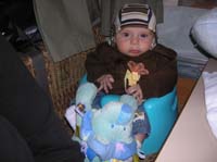 105-Kenny_all_bundled_up_sitting_in_his_Bumbo