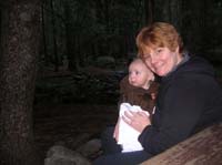 145-Kenny_and_Mommy_at_campground_with_small_stream_behind_us