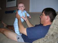 35-Kenny_and_Daddy_playing-Kenny_is_standing_up-kind_of