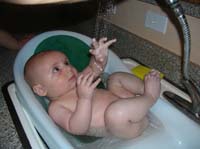 18-Kenny_taking_a_bath-enjoying_the_faucet