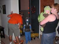 17-Joel_Toby_Sierra_Kenny_and_Mommy_greeting_trick_or_treaters