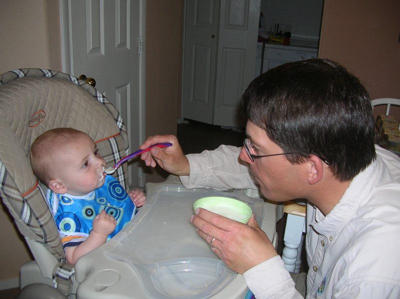 19-Daddy_feeding_Kenny_solid_food_night_2