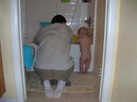 02-Daddy_and_Kenny_drawing_a_bath