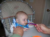 21-Kenny_eating_squash_for_the_first_time