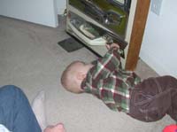 40-Kenny_learning_how_to_play_with_the_pachinko_machine