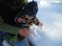 007-Kenny_touches_snow_for_first_time-he_didn't_like_it-too_cold
