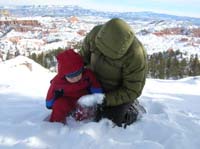 024-Mommy_showing_Kenny_a_handful_of_snow
