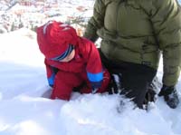 026-Kenny_is_not_interested_since_he_can't_move-too_stiff_in_snowsuit