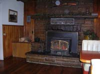 063-fireplace_provides_the_heat_for_the_Bryce_Canyon_Pines_Restaurant
