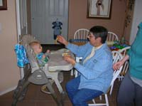 07-Baba_feeding_Kenny