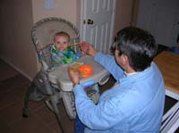 08-Baba_feeding_Kenny