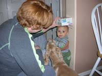 21-measuring_a_very_squirlly_Kenny's_height