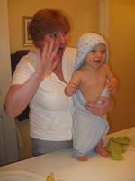28-Kenny_and_Mommy_mugging_in_the_mirror