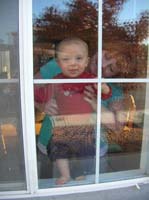 11-Kenny_sees_Daddy_through_window