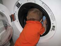 22-reaching_deep_into_the_washer