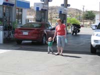 04-Kenny_taking_a_walk_with_Mommy_through_Kingman,AZ_gas_station
