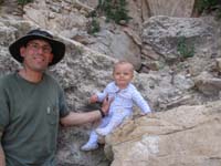 44-Kenny_resting_on_a_rock_with_Daddy