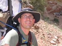 51-Daddy_and_sleeping_Kenny_with_Bighorn_Sheep_ewe_relaxing_near_trail