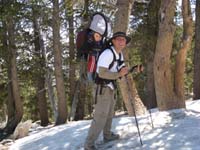 17-Daddy_walking_on_snow_at_about_9500_feet