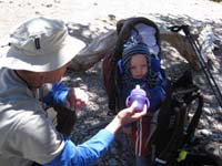 24-Grandpa_giving_Kenny_water_in_the_backpack_at_Raintree