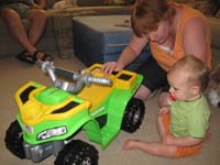 49-Mommy_showing_Kenny_his_ATV