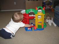 01-Kenny_plays_with_his_new_garage