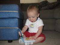 04-Kenny_looking_at_a_book