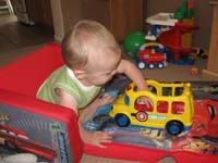 10-Kenny_playing_with_school_bus