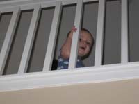 21-Kenny_watching_from_loft_as_Daddy_leaves_for_work