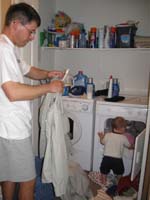 25-Kenny_helping_Daddy_with_the_laundry